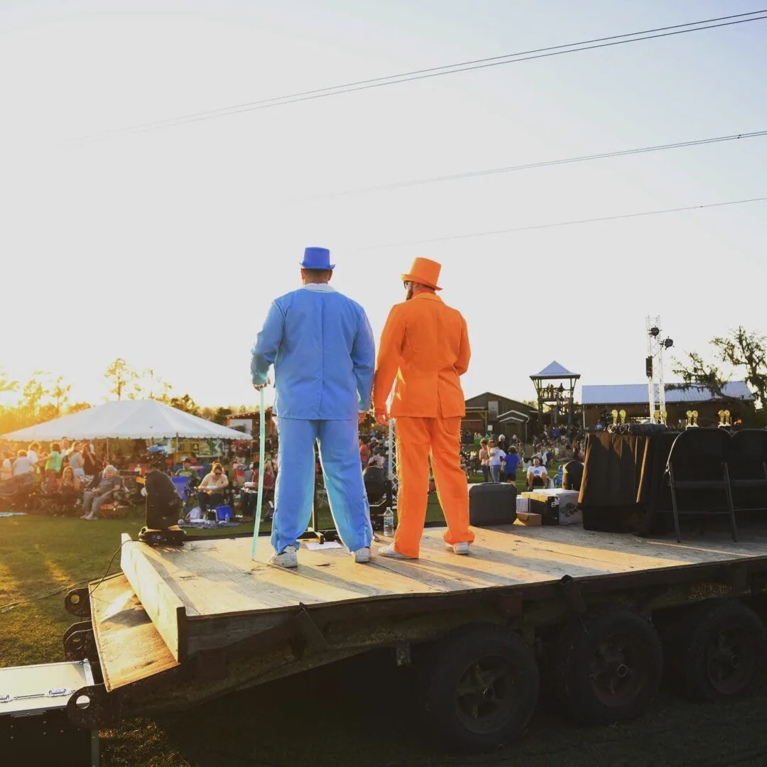 Two speakers on stage at a community event