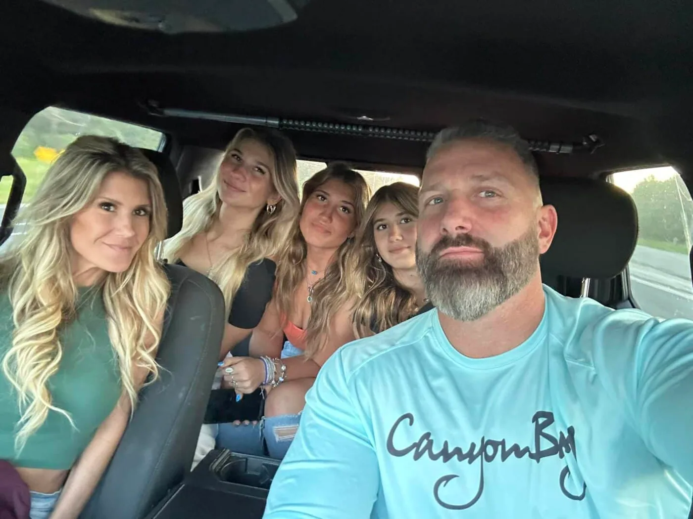 Regan Weiss with his family