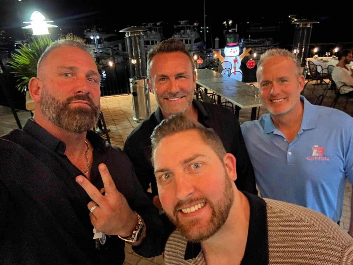 Regan Weiss with fellow business owners at an evening event