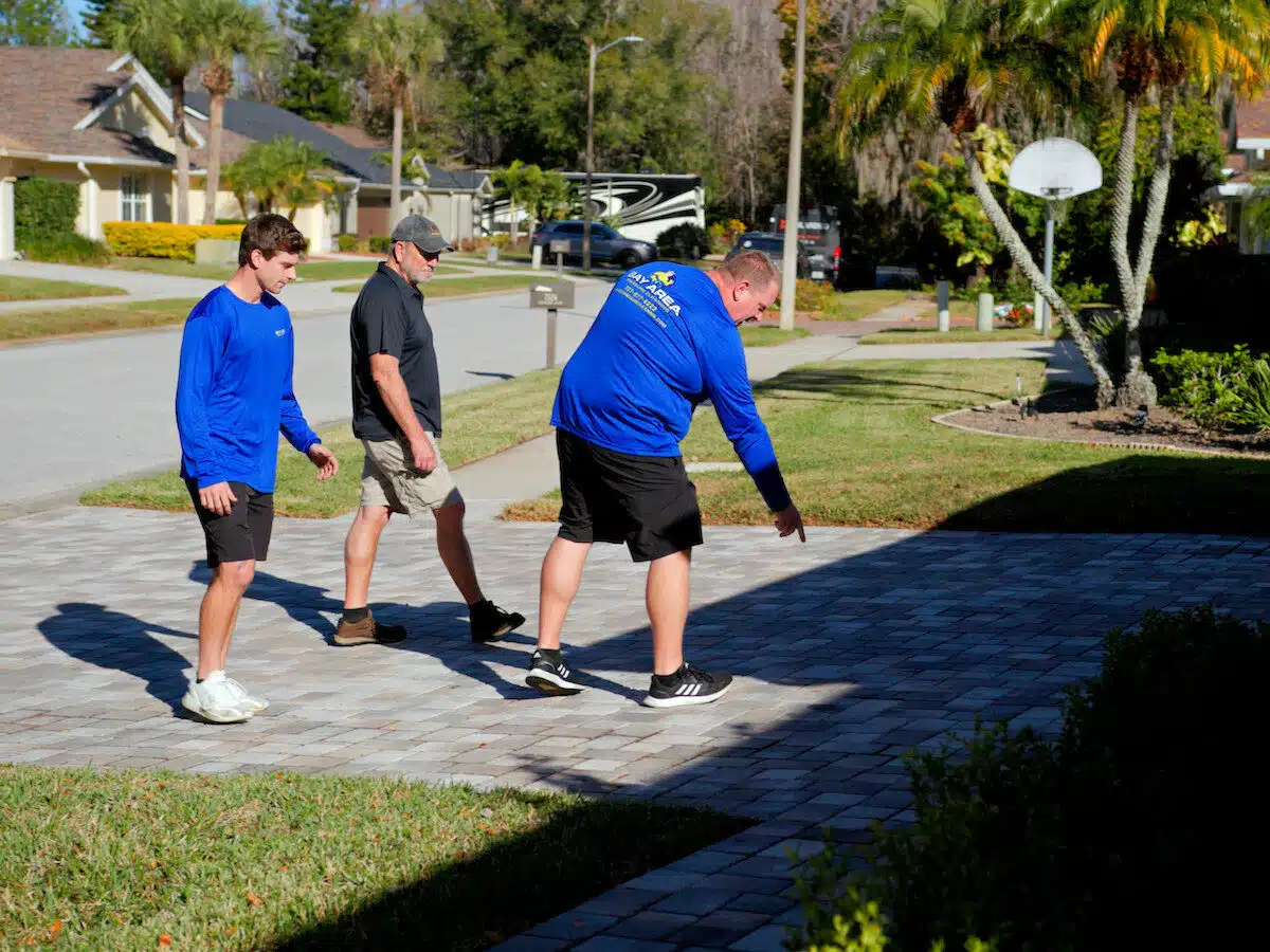 Bay Area Pressure Cleaning working on a house in New Port Richey FL